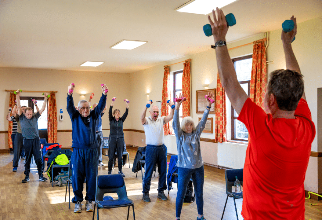 Instructor delivering an activity to participants living with parkinsons